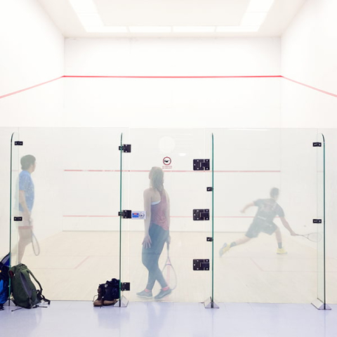 Photo of people playing squash